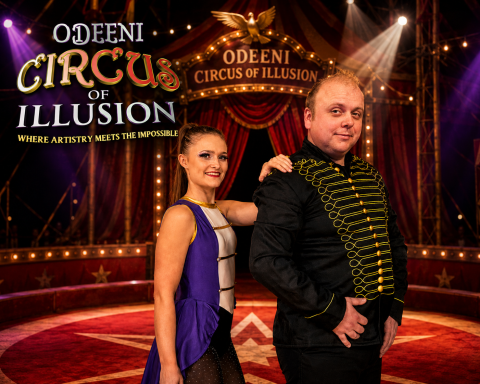 Odeeni Circus of Illusion performing in a theatrical circus ring.